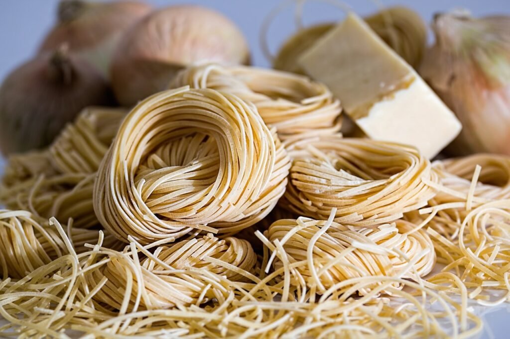 A plate full of pasta. Lot of carbs for fuel! Maybe too many.