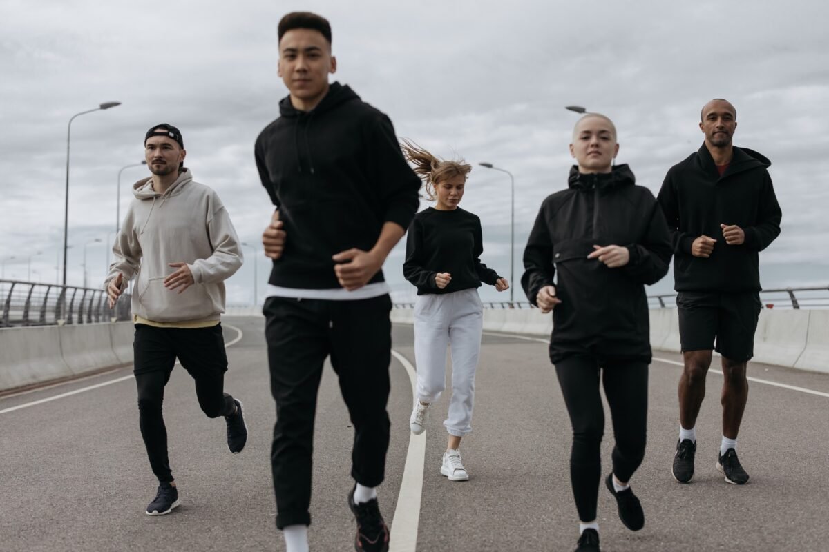 A group of five people jogging. Is running the best exercise for weight loss?