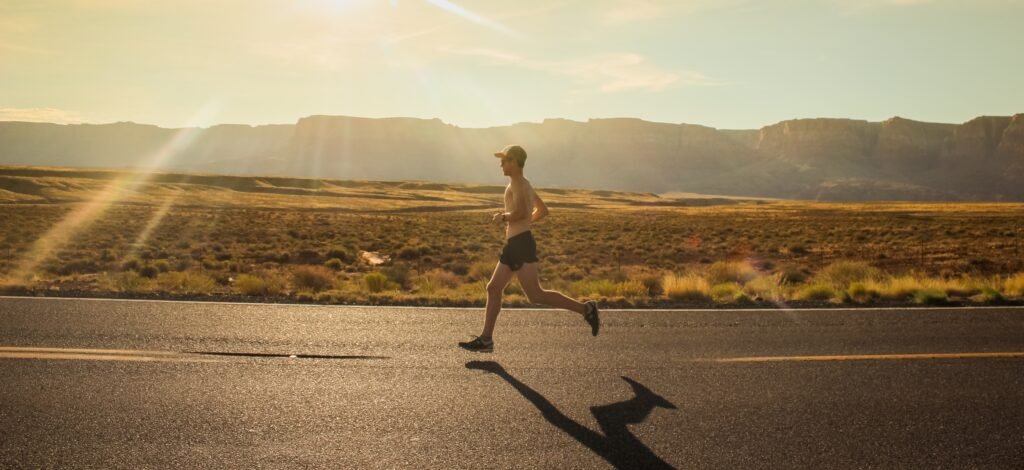 A man training for a marathon using the 80-20 marathon training plan.