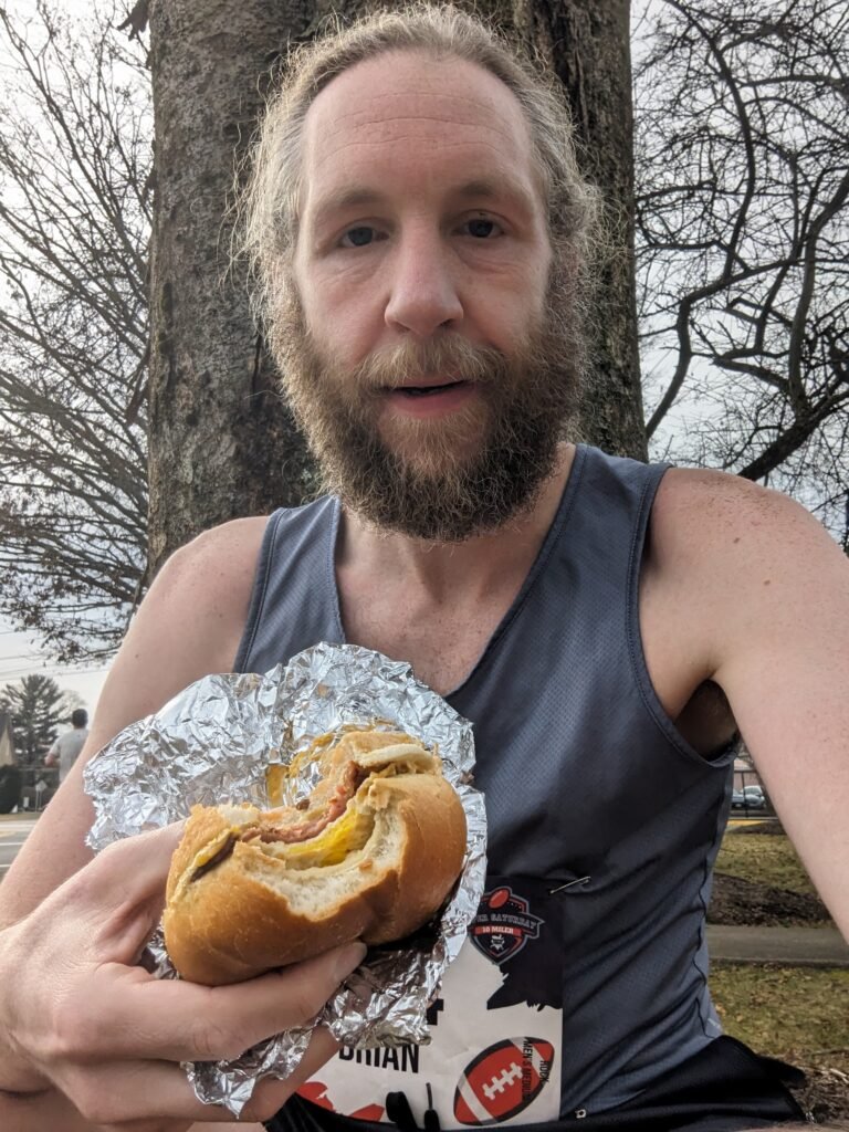 Me, eating a Taylor Ham, egg, and cheese sandwich while I watched the finish of the race.
