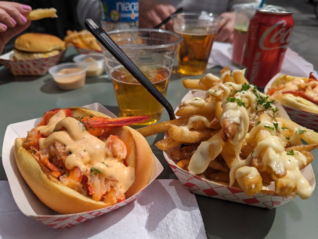 A lobster roll, truffle fries, and a beer at the after party.