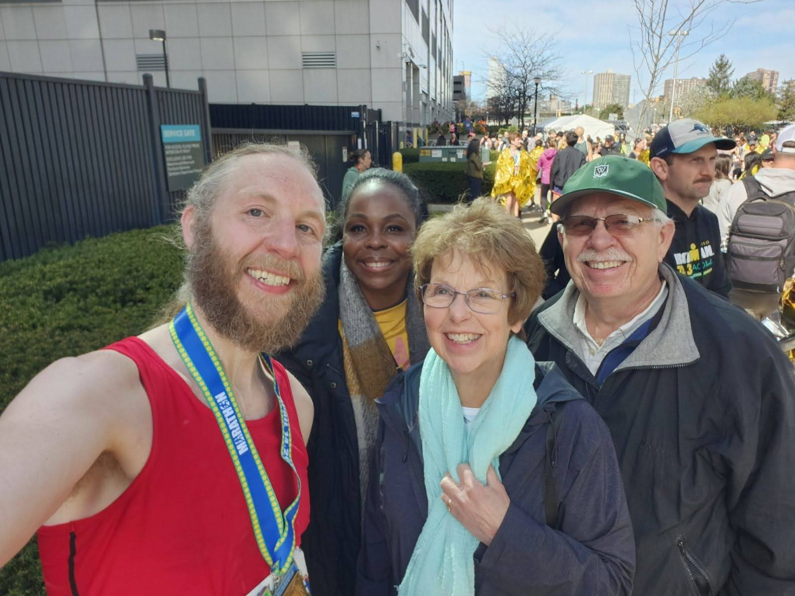 Me with my family at the finish line of the Jersey City Marathon.
