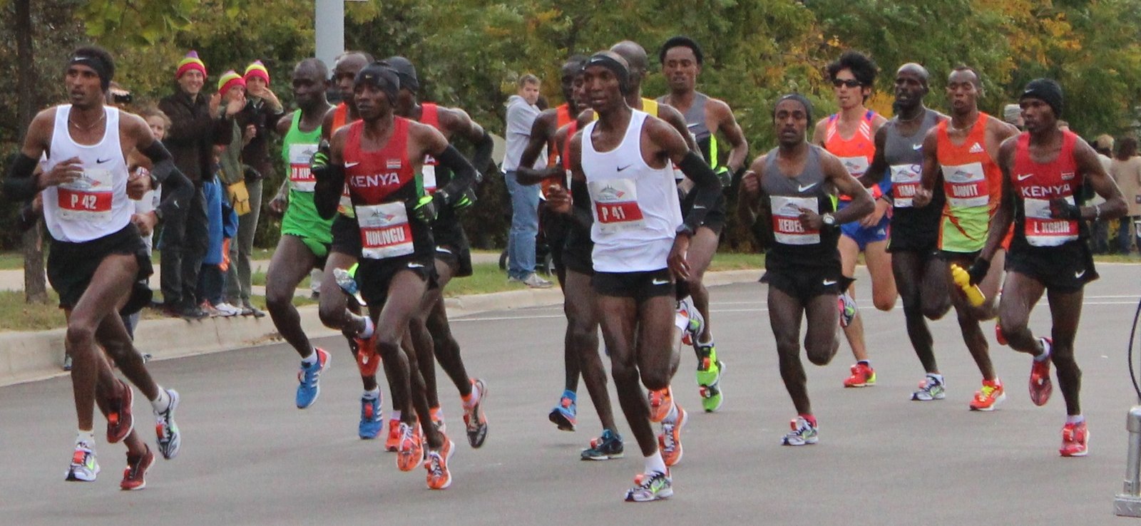 A group of male runners, the lead pack in the 2012 Chicago Marathon.