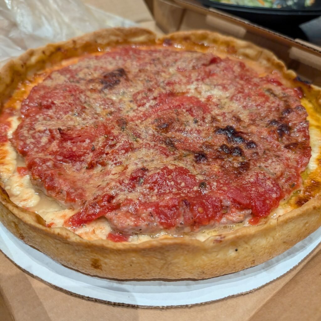 A deep dish pizza from Lou Malnati's. Delicious.