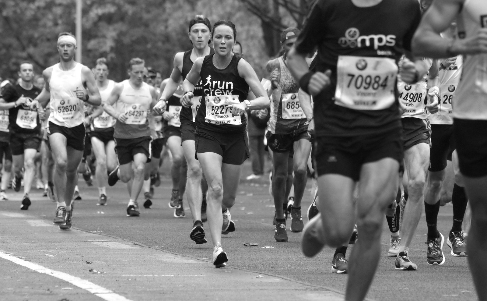 Black and white photo of runners in a marathon