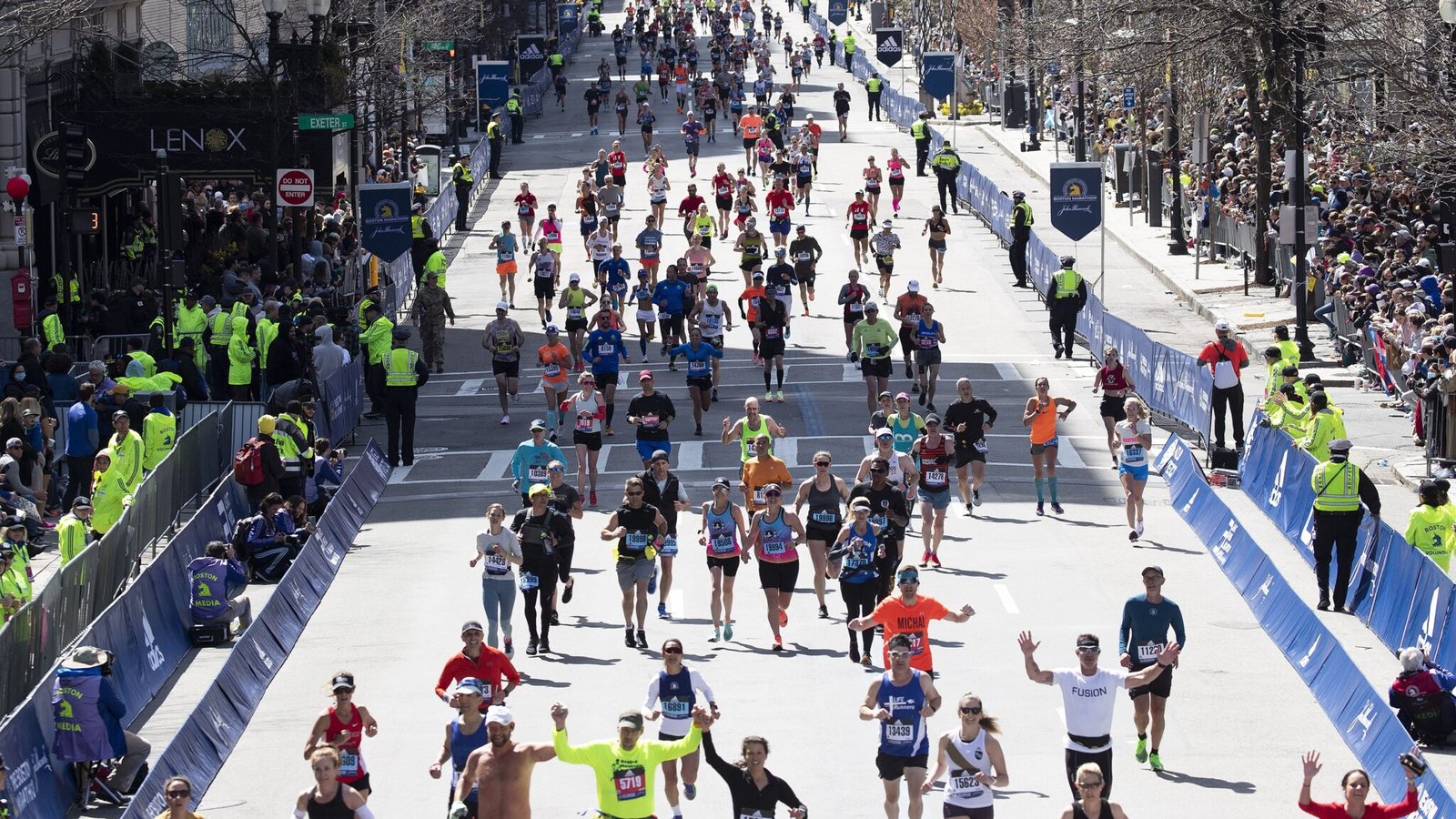 The finish at the 2022 Boston Marathon, with many Masters runners coming across the finish line.