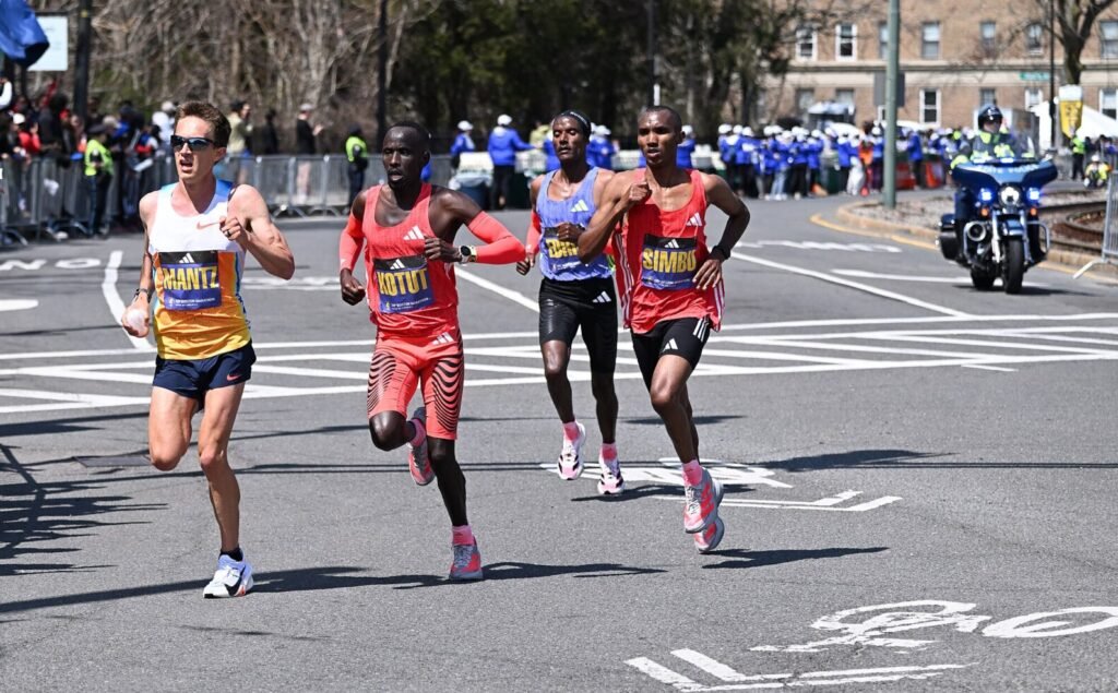 How Many Miles Do Elite Marathoners Run? - Running with Rock