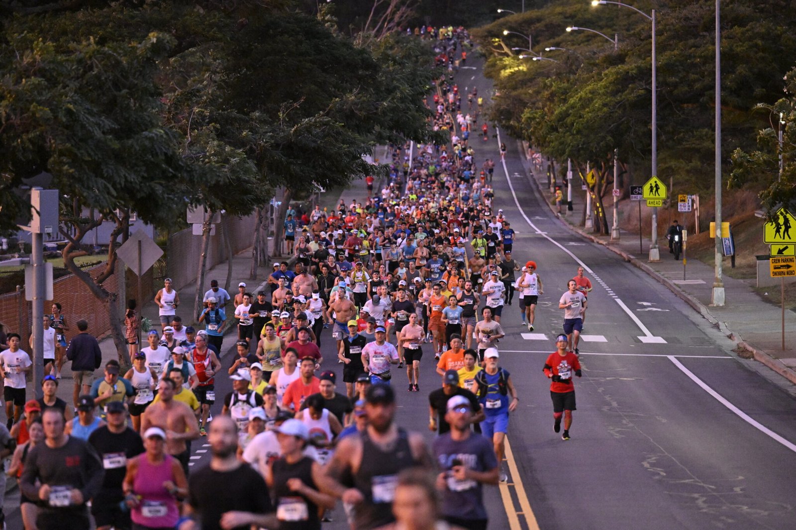 A mass of runners in the 2025 Honolulu Marathon.